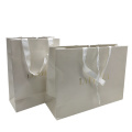 Custom Luxury White Card Gift Paper Shopping Clothes Bag Printed and Matte or Glossy Lamination with Ribbon Handle